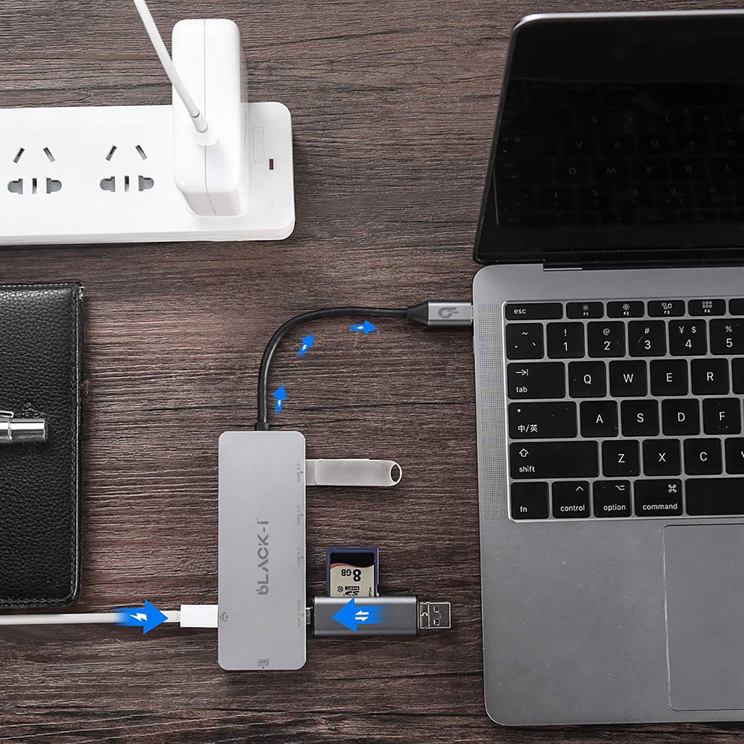 USB-C hub used in workstation setup with external display and accessories